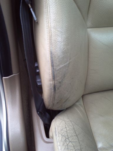 Damaged leather seat awaiting repair